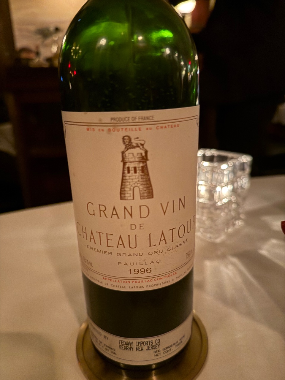 A bottle of 1996 Château Latour on a restaurant table
